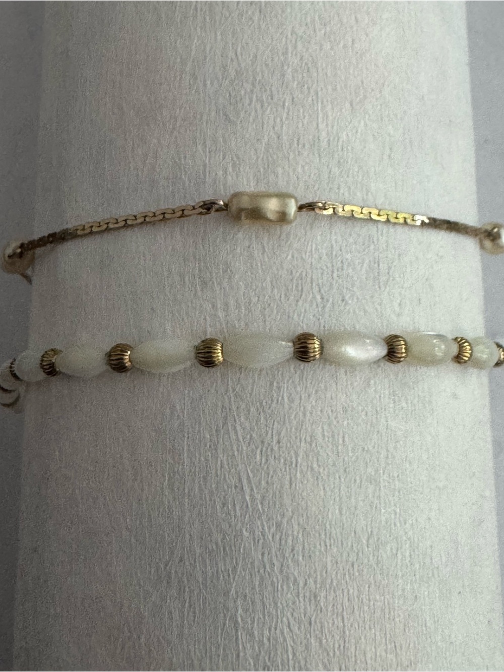Two vintage Avon Gold Tone bracelets. Mother of Pearl